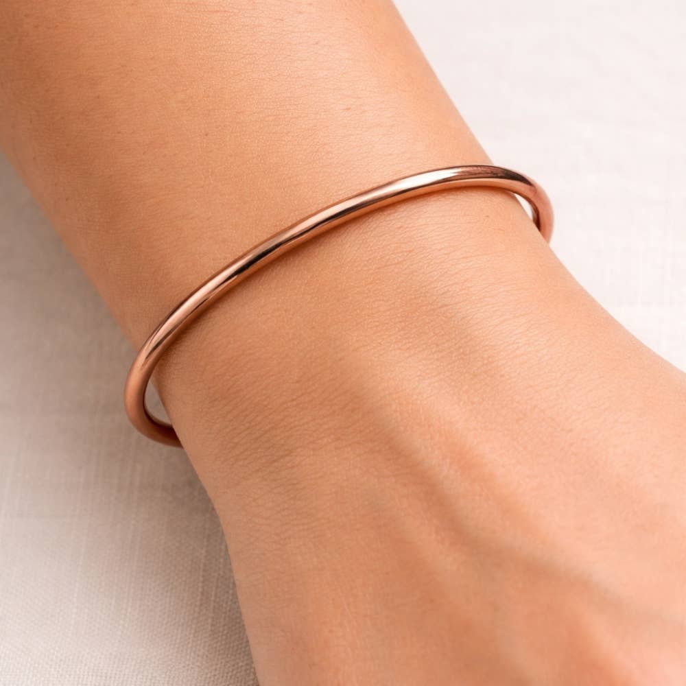 Glatpoleret armbånd i kobber med klemme og endekugler - Armbånd fra Ayurveda Specialist B.V. hos The Prince Webshop