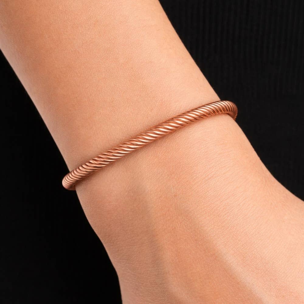 Kobber- og messingflettet klemarmbånd med endekugler - Armbånd fra Ayurveda Specialist B.V. hos The Prince Webshop